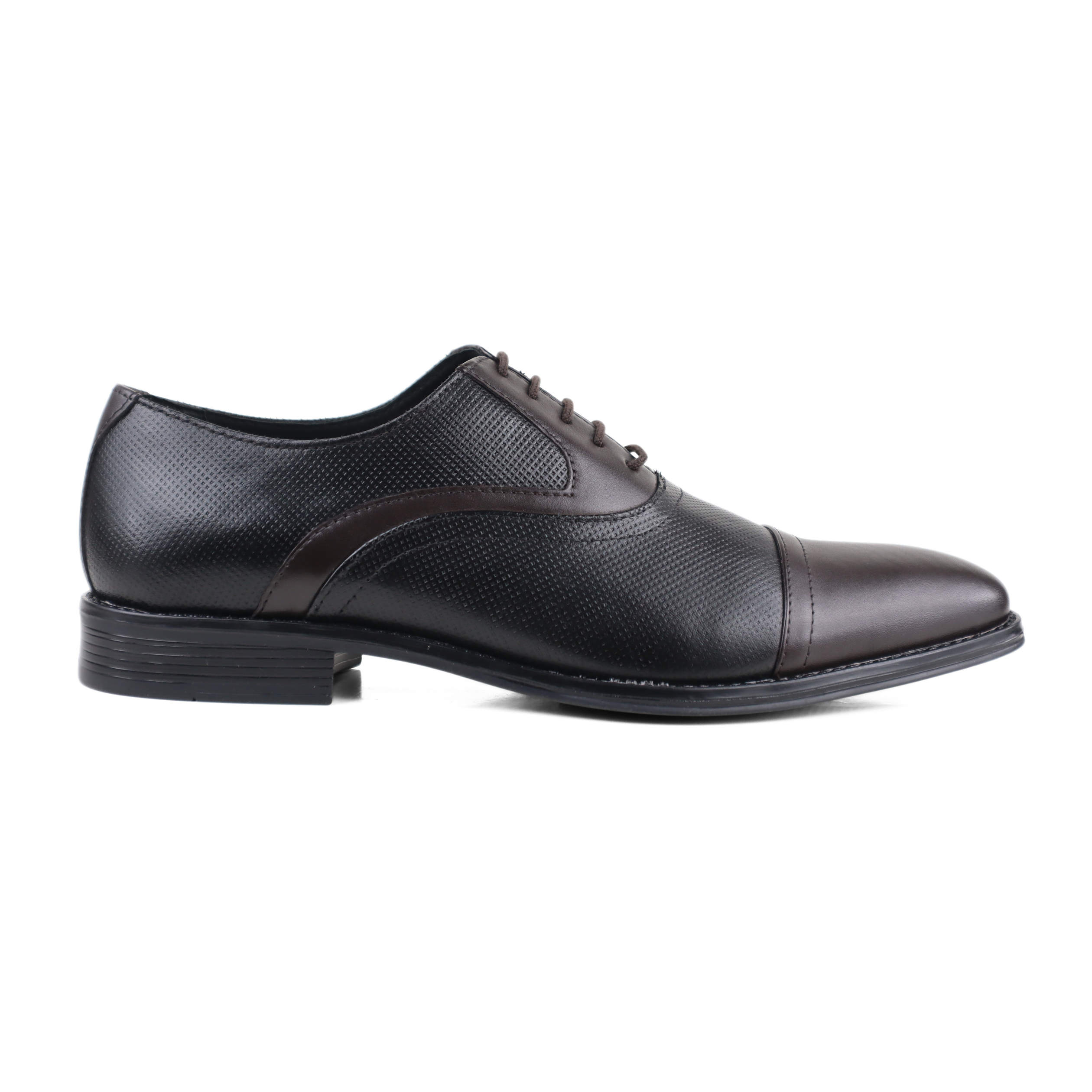 A single men's casual lace-up shoe in dark blue canvas with light beige laces, a brown leather heel tab, and a thick beige sole, shown in profile against a white background.